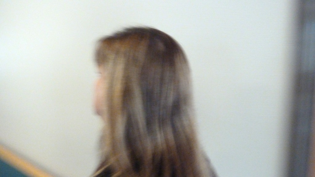 The Banality of Evil: Sara Dotson walks to call court security after refusing accommodation for Amy. (360-438-2059)